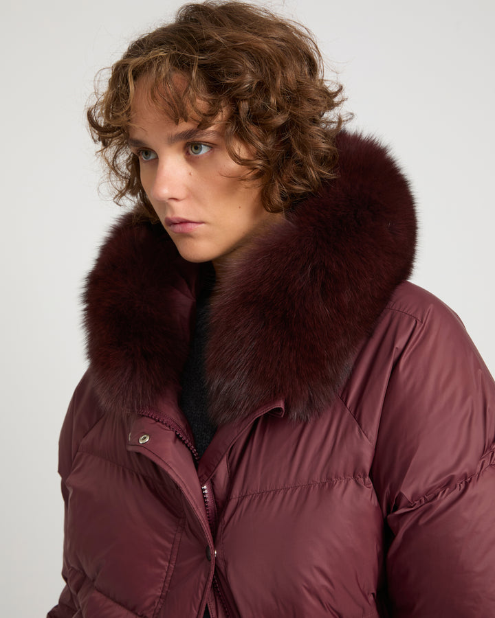Short down jacket with raglan sleeves and fox fur trim