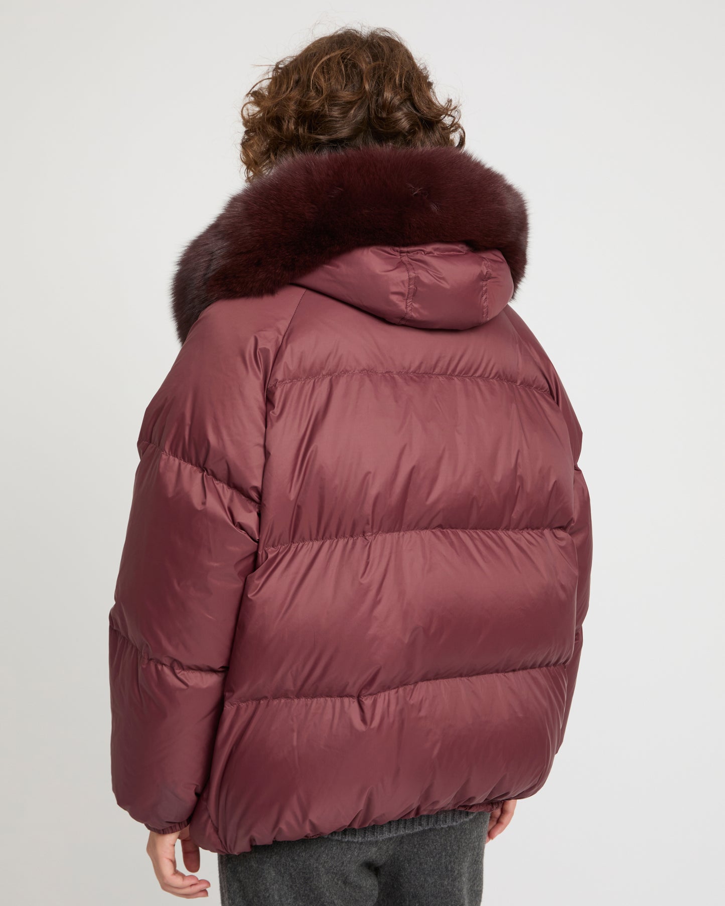 Short down jacket with raglan sleeves and fox fur trim