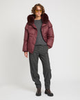 Short down jacket with raglan sleeves and fox fur trim
