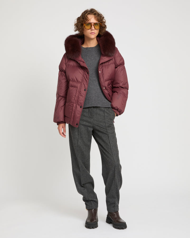 Short down jacket with raglan sleeves and fox fur trim