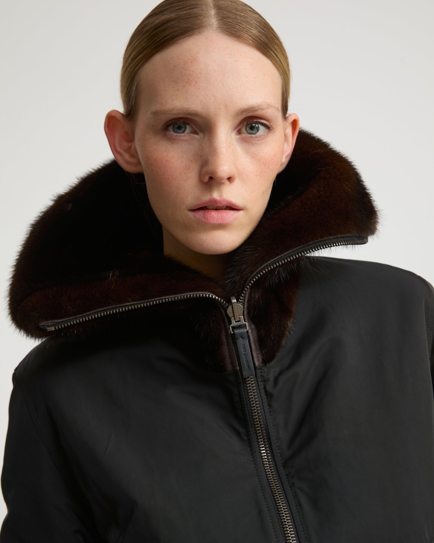 Reversible jacket in technical fabric and mink fur