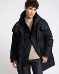 Long down jacket in waterproof jacquard fabric with mink fur bib panel