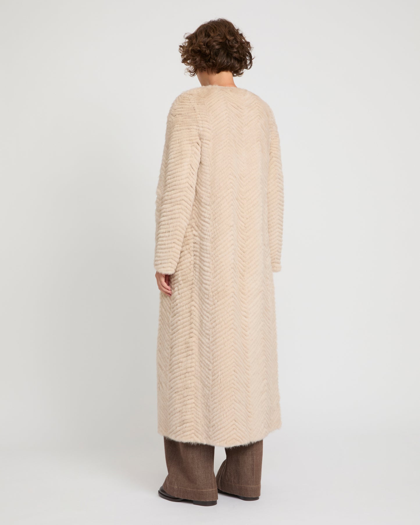 Long coat in Merino knit and mink fur