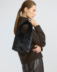 Mink fur bag with lamnskin details