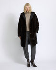Long smooth hooded down jacket in reversible water-repellent technical fabric and mink fur