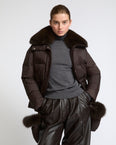Down jacket in waterproof technical fabric with mittens and fox fur trim