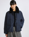 Short down jacket in waterproof technical fabric with mink fur trim