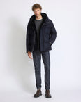 Short down jacket in waterproof jacquard fabric with mink fur bib panel