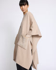 Merino knit poncho with mink fur