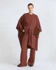 Merino knit poncho with mink fur