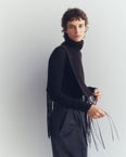 100% cashmere knit bib with leather fringes